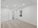 Bright bedroom with carpet flooring, double closets, and a window at 3563 Denby Dr, Snellville, GA 30039