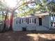 Gray house with black shutters, front door, and steps at 890 Mcwilliams Se Rd, Atlanta, GA 30315