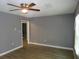 Simple bedroom with hardwood floors and ceiling fan at 890 Mcwilliams Se Rd, Atlanta, GA 30315