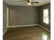 Spacious living room with hardwood floors and ceiling fan at 890 Mcwilliams Se Rd, Atlanta, GA 30315