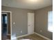 Bedroom with neutral walls, one window, and a closet at 890 Mcwilliams Se Rd, Atlanta, GA 30315