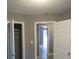 Bedroom with doors to closets and other rooms, and wood-look flooring at 890 Mcwilliams Se Rd, Atlanta, GA 30315