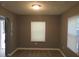 Cozy bedroom with one window and neutral walls at 890 Mcwilliams Se Rd, Atlanta, GA 30315