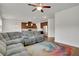 Spacious living room with sectional sofa and view into kitchen at 5820 Keystone Pt, Lithonia, GA 30058
