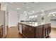 Large kitchen island with granite countertop and seating at 5820 Keystone Pt, Lithonia, GA 30058