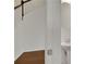 Small half bathroom with pedestal sink and simple mirror at 5820 Keystone Pt, Lithonia, GA 30058