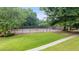 Well-maintained tennis courts in a tree-lined setting at 1108 Red Bud Cir, Villa Rica, GA 30180