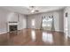 Bright living room with hardwood floors, fireplace and window seating at 1108 Red Bud Cir, Villa Rica, GA 30180