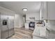 Modern kitchen featuring stainless steel appliances and granite countertops at 3745 Londonderry Ct, Stonecrest, GA 30038