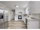 Updated kitchen with stainless steel appliances and granite countertops at 3745 Londonderry Ct, Stonecrest, GA 30038