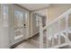 Bright and airy entryway with new flooring, stairs, and exterior access at 3745 Londonderry Ct, Stonecrest, GA 30038
