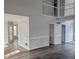 Living room with hardwood floors and high ceilings at 20 Wisteria Blvd, Covington, GA 30016