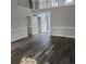 Spacious living room with hardwood floors and high ceilings at 20 Wisteria Blvd, Covington, GA 30016