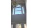 Two-story foyer with chandelier and large windows at 20 Wisteria Blvd, Covington, GA 30016