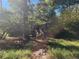 Rustic house nestled in a wooded area with a small deck at 2281 Carr Ne Rd, Conyers, GA 30012