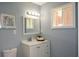 Bathroom with vanity, toilet and window at 1869 Tremont Nw Dr, Atlanta, GA 30314