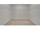 Large walk-in closet with wire shelving at 63 Homesite Cooper W Cv, Fayetteville, GA 30214