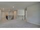 Spacious loft area with neutral carpeting and access to bedrooms and stairs at 63 Homesite Cooper W Cv, Fayetteville, GA 30214
