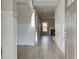 Bright entry hall with hardwood floors and neutral paint at 63 Homesite Cooper W Cv, Fayetteville, GA 30214