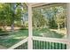 Spacious backyard with lush greenery and a wooden shed at 2690 Old Hickory Nw Dr, Marietta, GA 30064