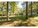 Large backyard with mature trees and open space at 2690 Old Hickory Nw Dr, Marietta, GA 30064