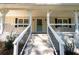 White steps leading to a charming front door with black accents at 2690 Old Hickory Nw Dr, Marietta, GA 30064