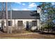 Craftsman style home with metal roof and landscaping at 377 Anders N, Chattahoochee Hills, GA 30268