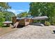 Brick home with a carport and large backyard at 2953 Collier Nw Dr, Atlanta, GA 30318