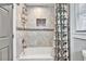 Updated bathroom with tile shower and tub at 2953 Collier Nw Dr, Atlanta, GA 30318
