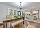 Open concept dining area with hardwood floors and kitchen views at 2953 Collier Nw Dr, Atlanta, GA 30318