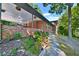 Landscaped walkway leading to a brick home with covered entry at 2953 Collier Nw Dr, Atlanta, GA 30318