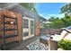 Relaxing deck with seating area and brick wall at 2953 Collier Nw Dr, Atlanta, GA 30318