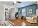 Bright home office with hardwood floors and built-in shelves at 2953 Collier Nw Dr, Atlanta, GA 30318