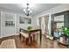 Bright dining room with hardwood floors and access to back patio at 2953 Collier Nw Dr, Atlanta, GA 30318
