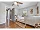 Bright bedroom with hardwood floors and a comfortable bed at 2953 Collier Nw Dr, Atlanta, GA 30318