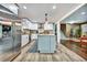 Spacious kitchen with island, stainless steel appliances, and hardwood floors at 2953 Collier Nw Dr, Atlanta, GA 30318