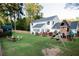 Spacious backyard with playset, shed, and firepit at 4619 Spring St, Acworth, GA 30101