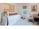 Inviting bedroom with daybed, functional workspace and nature-inspired decor at 4619 Spring St, Acworth, GA 30101