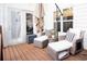 Relaxing deck with comfortable seating and a shade umbrella at 4619 Spring St, Acworth, GA 30101