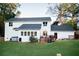 White two story house with large backyard and deck at 4619 Spring St, Acworth, GA 30101