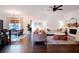 Spacious living room with hardwood floors, a fireplace, and comfortable seating at 4619 Spring St, Acworth, GA 30101