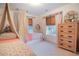 Well-lit bedroom featuring two twin beds with playful decor and ample closet space at 4619 Spring St, Acworth, GA 30101