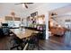 Farmhouse style dining area with a large table, and access to the living room at 4619 Spring St, Acworth, GA 30101