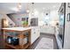 Modern kitchen featuring white cabinets, stainless steel appliances, and a large island at 4619 Spring St, Acworth, GA 30101