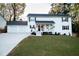 Two story white house with two car garage and front porch at 4619 Spring St, Acworth, GA 30101