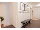 Inviting entryway with bench, hooks, and board and batten at 4619 Spring St, Acworth, GA 30101
