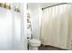 Clean bathroom with shower/tub combo, toilet, and stylish decor at 4619 Spring St, Acworth, GA 30101