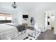Bright bedroom with hardwood floors and ensuite bathroom access at 4619 Spring St, Acworth, GA 30101