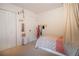 Cozy bedroom with a twin bed, stylish wall decor and built in storage at 4619 Spring St, Acworth, GA 30101