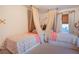 Bright bedroom with two twin beds, a whimsical design, and plenty of natural light at 4619 Spring St, Acworth, GA 30101